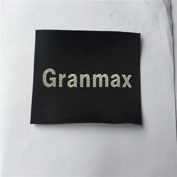 

Custom High Density Silver Polyester Letters Weaving jacquard Clothing Labels Woven Labels