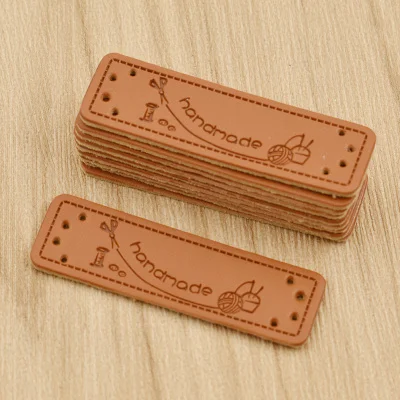 50pcs Personality Mutli Pattern Sewing Handmade PU Leather Labels For Garment Bag Needlework Decoration