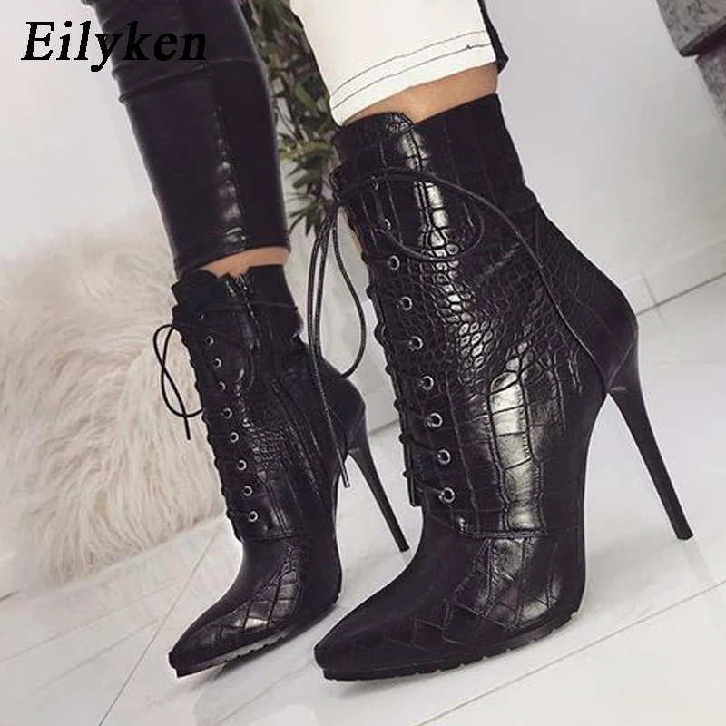 snakeskin lace up boots
