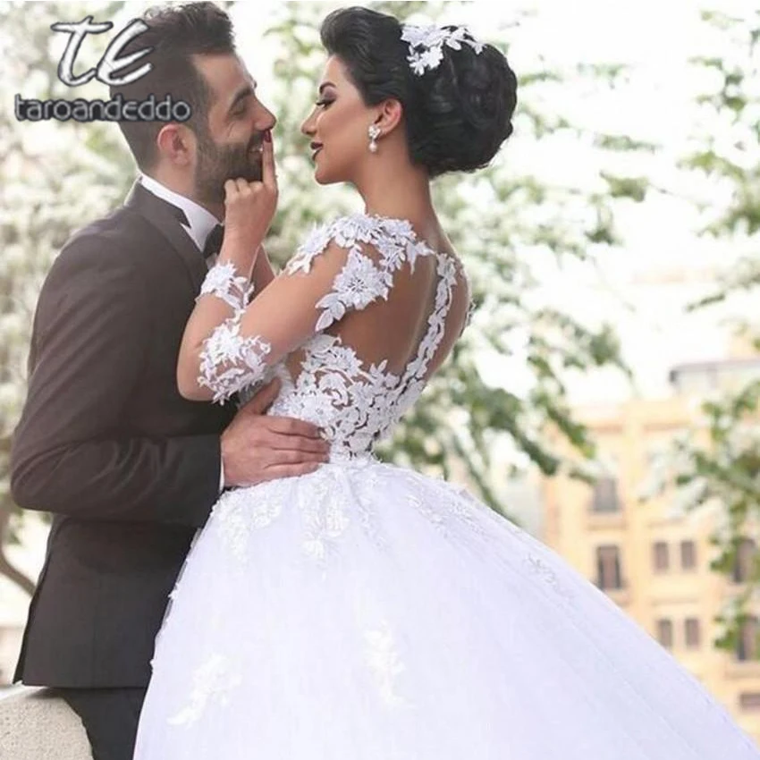 

Scoop Ball Gown Wedding Dresses Illusion Back Long Sleeves Lace Appliques Floor Length Court Train Bridal Gown Dress 2019