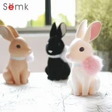 Hucha de diseño | Conejos de peluche con borla