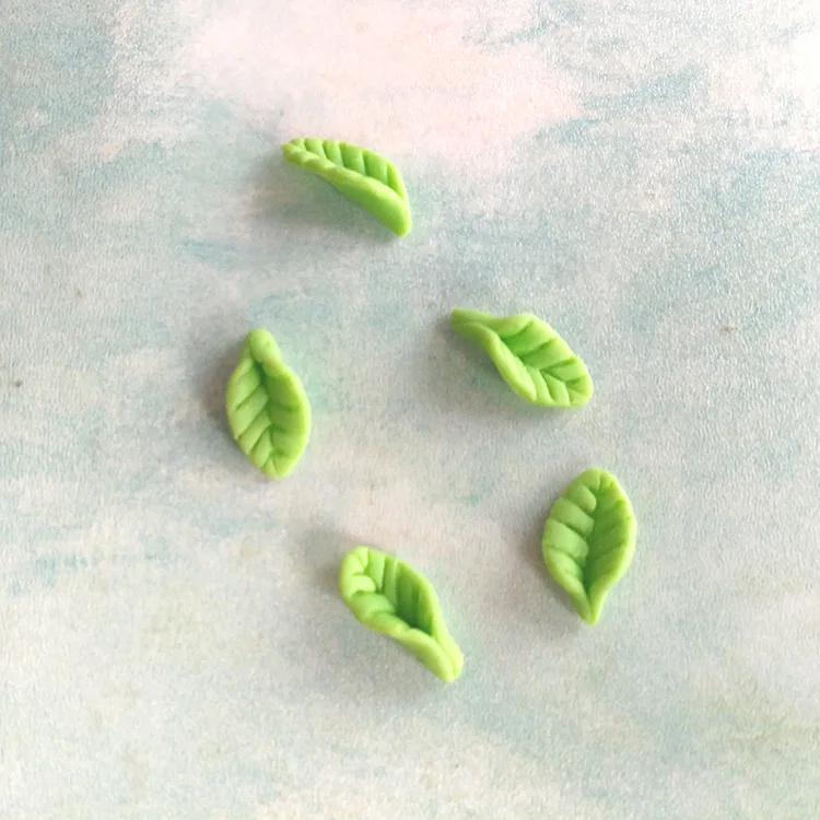 

200pcs/lot polymer clay lovely green leaf 1mm Scrapbook Embellishment DIY Phone Decoration