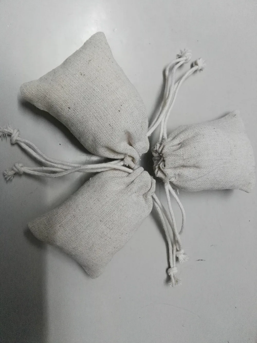 

special sale 100pcs/lot 9*13cm overlocked linen jewelry bag cheap drawstring bag gift pouch bangle Packaging bag free shipping