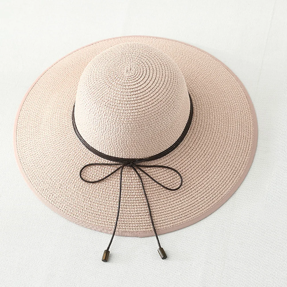 النساء قبعة الشمس ظلة في الهواء الطلق واسعة حافة الشاطئ قبعة الأشعة فوق البنفسجية حماية Bowknot عارضة طوي القش الصيف بسيط مرن الأزياء