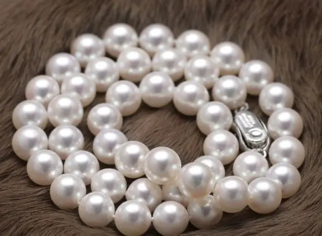 

natural 11-12mm natural south seas white pearl necklace 20 inch silver clasp