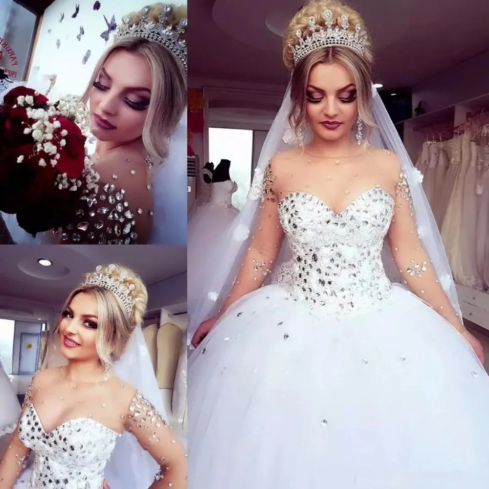 2018-luxury-crystals-beaded-ball-gown-wedding-dresses-sheer-neck-sweetheart-neck-long-sleeve-tulle-princess-plus-size-bridal-gowns.webp_