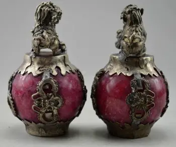 

A Pair of Chinese feng shui fu dog kirin silver phoenix artificial red jade statues.