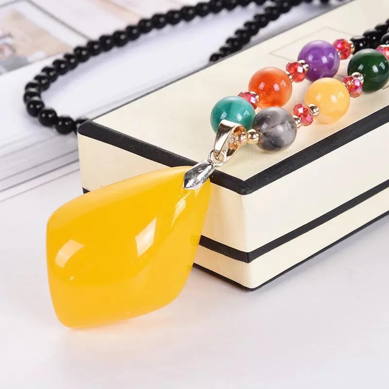 

Long sweater chain lady Yellow pendants of various sizes fashion necklace spring and summer long chain accessories