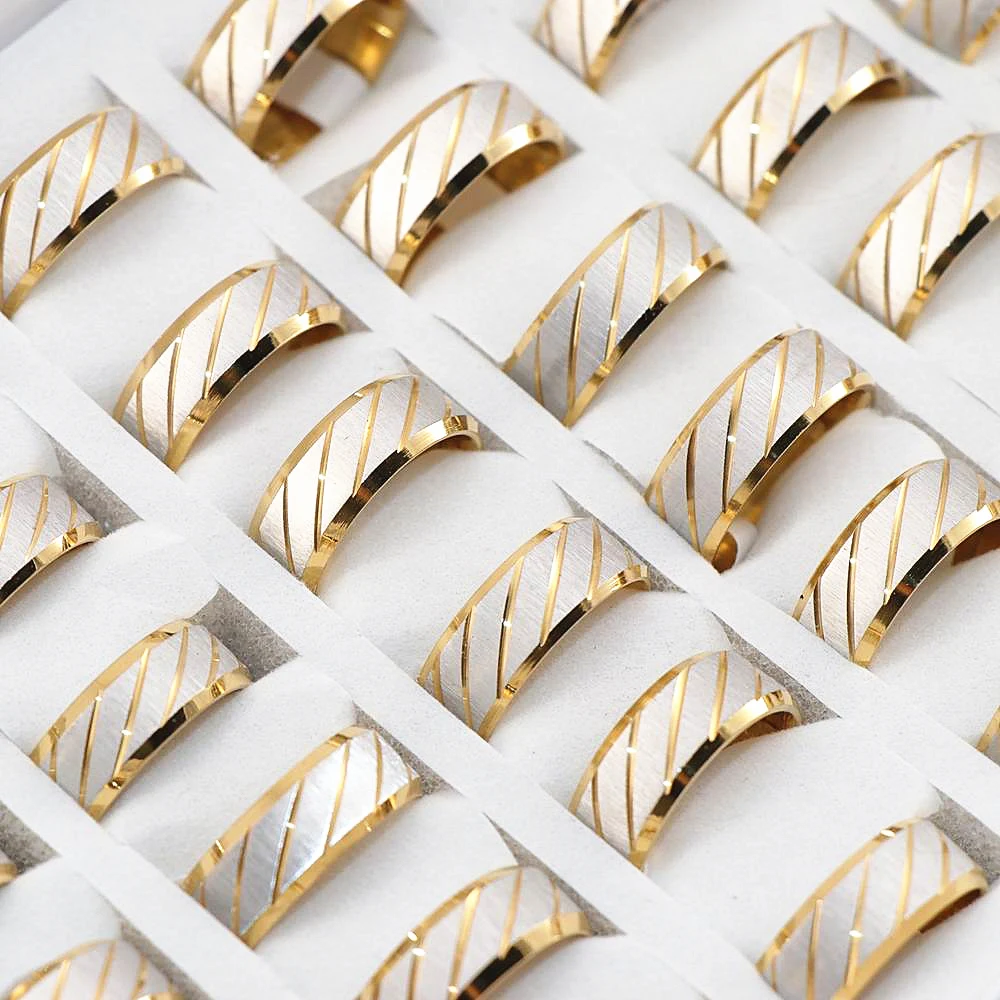 

Wholesale 36 Pcs/lot Diagonal stripes Golden Stainless steel Rings Mens ring polished inside