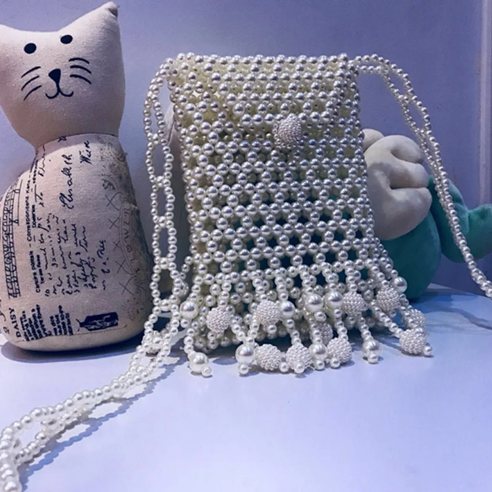 

Pure Hand-made Bead-string New Pearl-wrapped Ins Wind Super Fire Ethnic Craft Inclined Straddle-wrapped Perilla Pure-color Bag