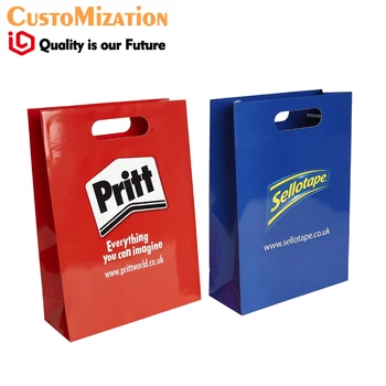 

Luxury paper carrier bag with gloss or matt finish and die cut handles multi colour printing