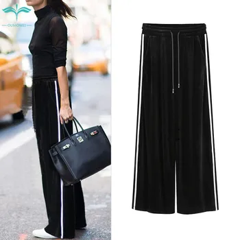 

OUMOWEI Women's Cropped Pants Loose Black Striped High Waist Casual Pants Women's Elastic Waist Wide Leg Pants M To 6XL Size