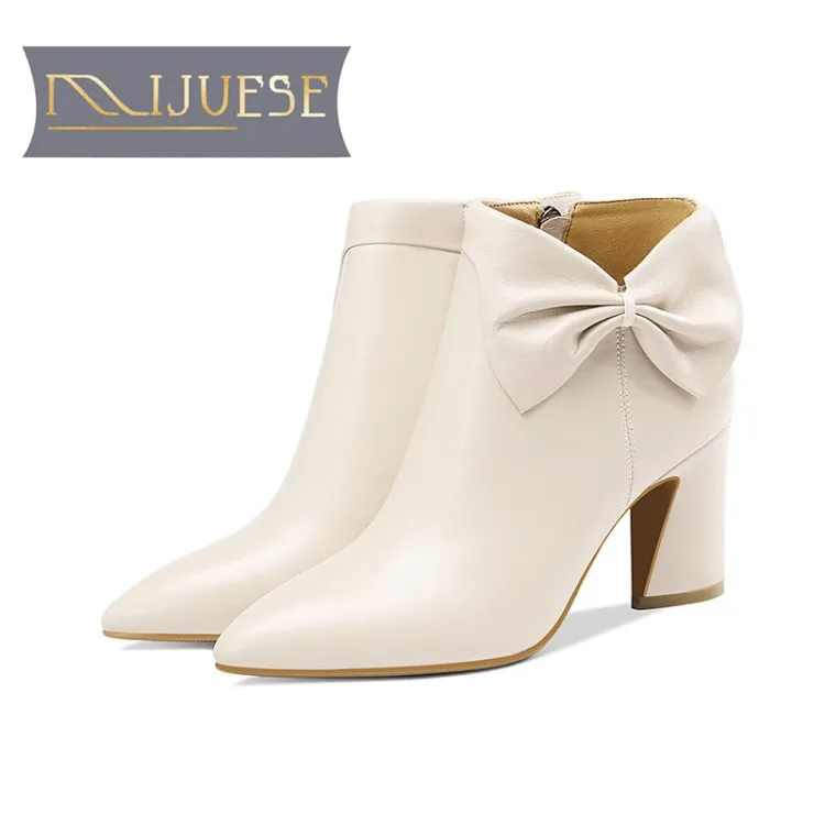 cream heeled ankle boots