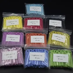 10 упаковок (10400 шт) Стоматологическая Ортодонтическая Лигатура подтяжки эластичные резинки (36 цветов на выбор) оставьте сообщение