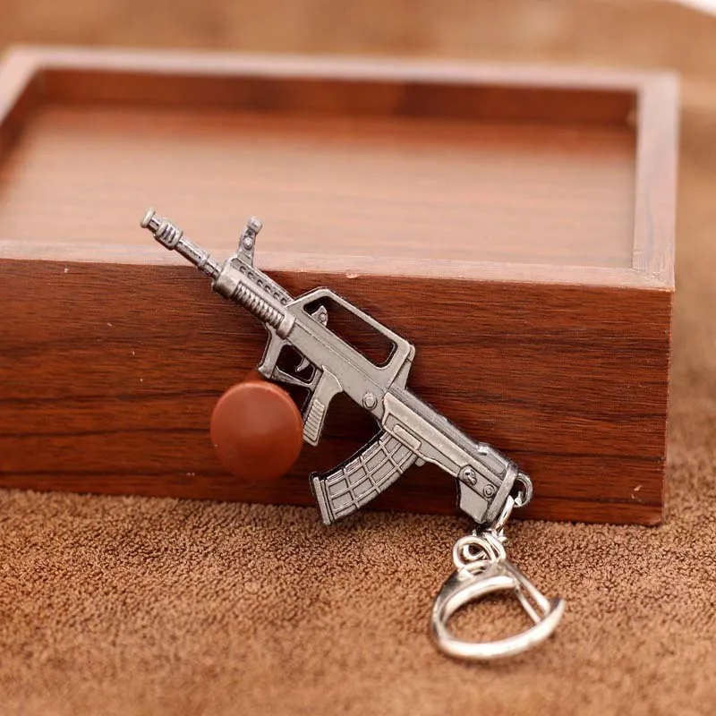 10 Style Guns Weapon Keychain Retro Mini AUG AK47 Rifle Revolver Tank Gun Metal Key Chain For Unisex Cool Gifts Fashion Jewelry