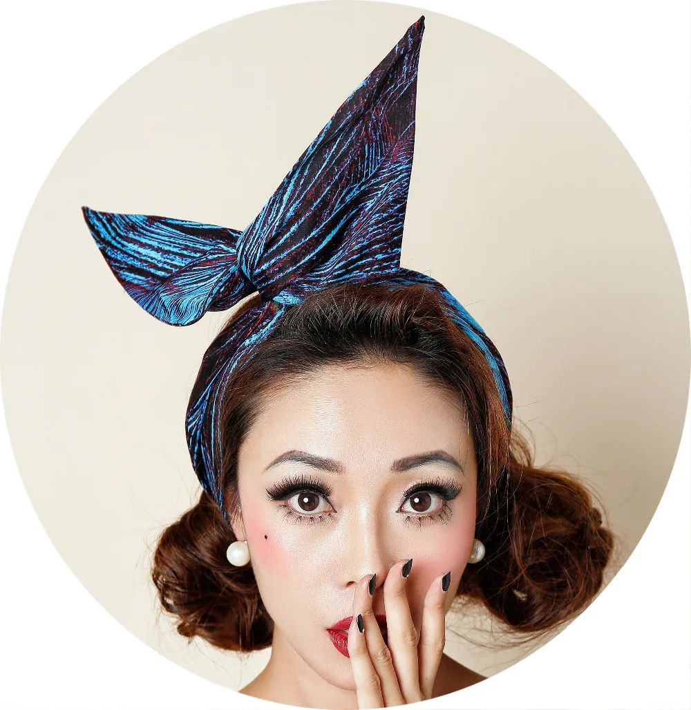 1950s women vintage rockabilly pinup blue Peacock feathers headband