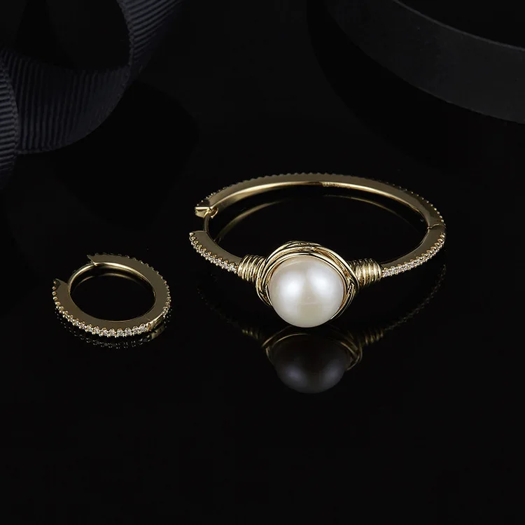 

Ins-APM European and American S925 sterling silver microinlaid asymmetry INTEMPOREL pearl earrings personality match