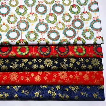 

Half meter Japanese soft breeze gilt Christmas flower snow cherry print fabric for handmade DIY mouth gold package bag B244