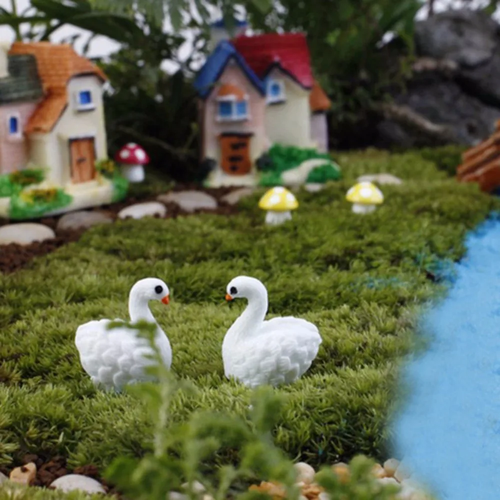 swan ornaments for garden