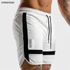 Nuevos Pantalones deportivos para hombre de verano Gyms entrenamiento para hombre malla transpirable de secado rápido ropa deportiva Jogger playa marca pantalones cortos ► Foto 1/6