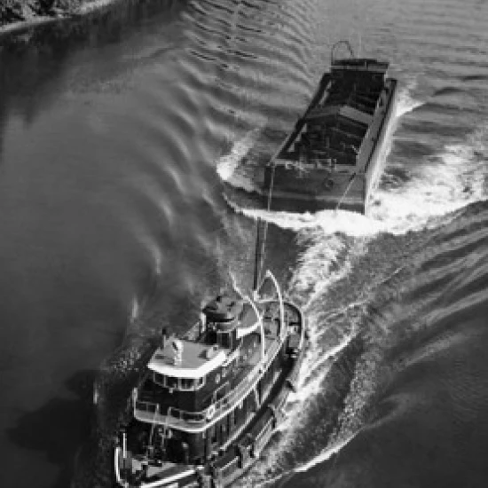 High angle view of a tugboat pulling a cargo container Poster Print (18 x 24)