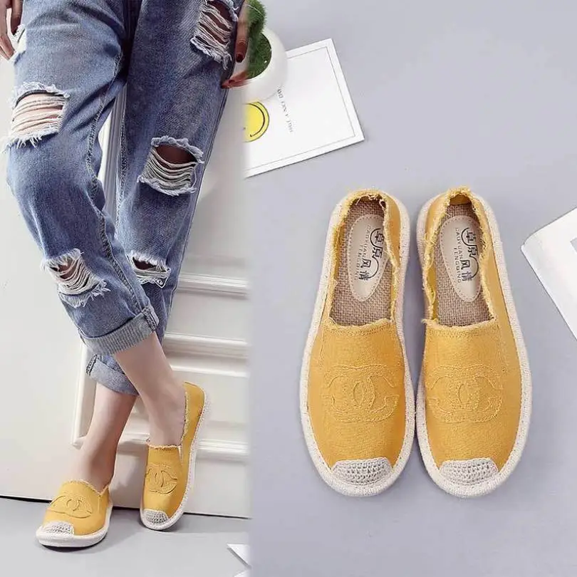 

Summer canvas shoes female students a pedal women's shoes wild flat shallow mouth lazy shoes fisherman shoes tide