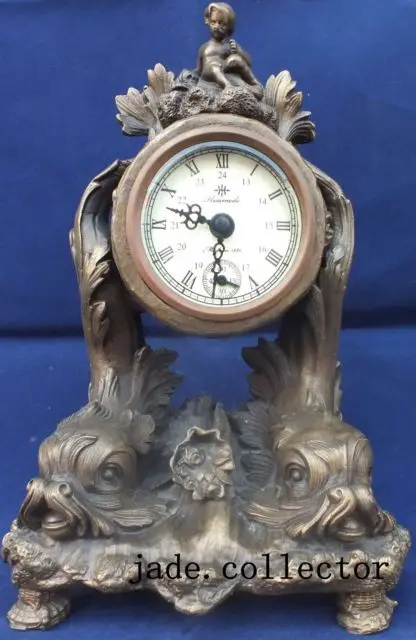 

Rare brass Dynamic angel Mechanical Table Clock Decorations