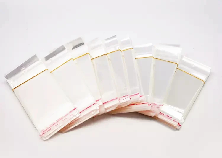 100pcs 7x14cm Clear Self Adhesive Seal Plastic Bags Transparent Resealable OPP Packing Poly Bags Pick Beads Hanging Holes