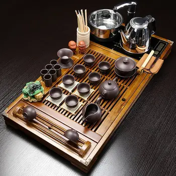 

Purple Sand Kung Fu Teapot Solid Wood Tea Tray Home Whole set Ice Cracked Tea set Four-in one Electric Hot Magnetic Stove