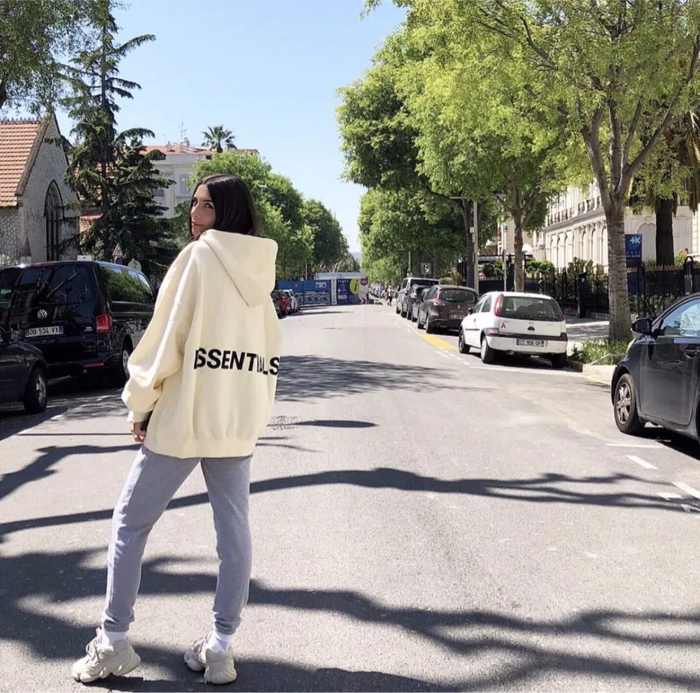 fear of god essentials graphic pullover hoodie black