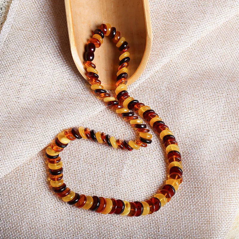 

JIUDUO Exclusive original natural beeswax amber with the shape of raw materials combination of multi - treasure necklace