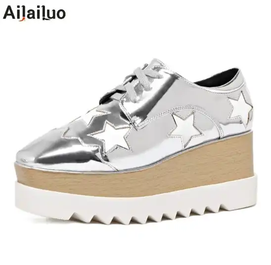 silver and black wedges