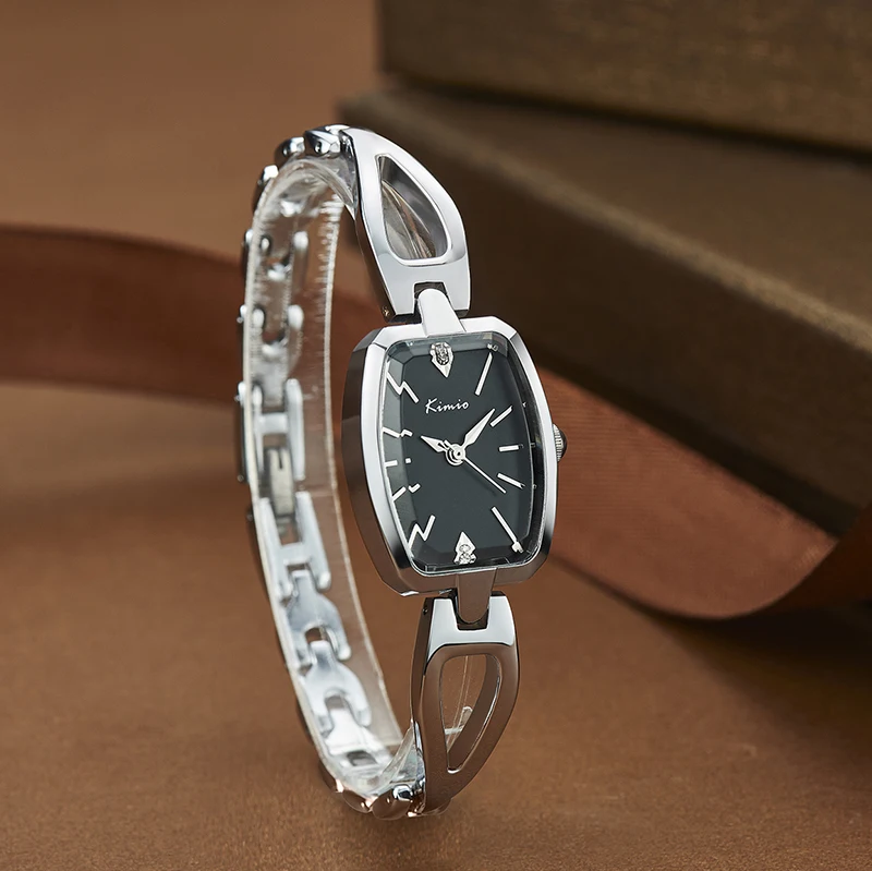 Kopen KIMIO Luxe Vrouwen Armband Horloges Rvs Hollow Rose Vergulde Vrouwelijke Quartz Horloge 2017 Montre Femme Met Doos