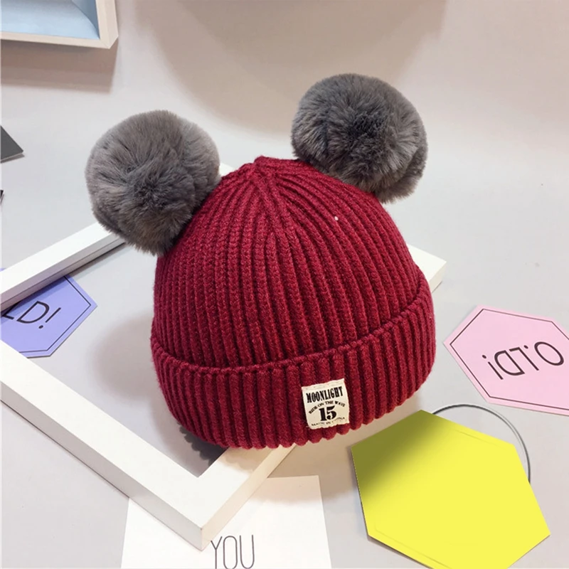 winter hats with two balls on top