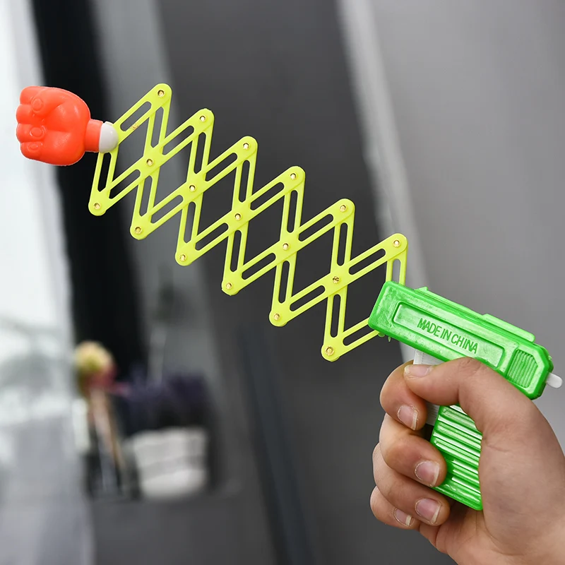 Ant Горячие ностальгию пистолет с кулаком дети весело маленькие игрушки оптовая продажа творческий Весна пистолет для взрослых пародия