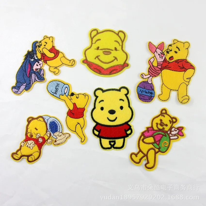 

Free shipping New Style 7pcs Winnie the Pooh Iron On Patches Embroidery Patches For Clothing Cartoon DIY Appliques High Quality