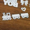 QITAI 11pcs/Pack Cutting Die Rocking Horse/Bunting/Aircraft/Bow/Duck/Letter/Train/Heart Creative Decoration Wholesale D134 ► Photo 3/6