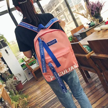 

Korean version of personalized letters backpack high school students fashion ribbon large bag casual a generation