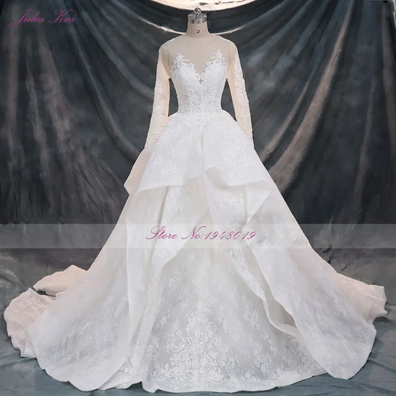 Julia Kui New Arrival Full Sleeves Appliques Lace Long Beading O-Neck Lace-Up Ball Gown Puffy Tiered Princess Wedding Dresses |