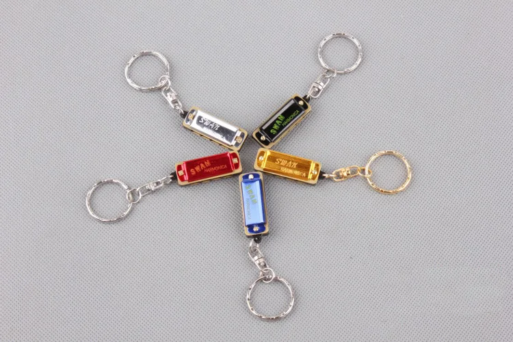 

1pcs Mini 4 Hole Small Key Harmonica Adults Children Beginner Gift Unisex Learning & Exercising Type Whistling 2021