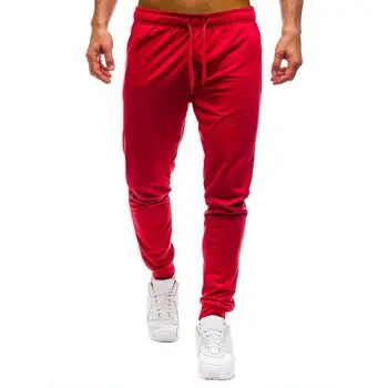 

New Hot sell Casual Men Solid Color Drawstring Elastic Loose Pants Pockets Autumn Trousers