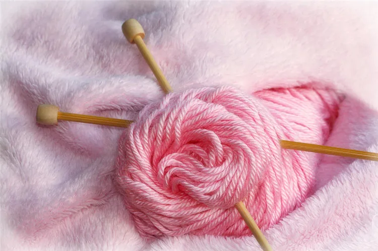 knitting-needles-in-pretty-pink-yarn-tracie-kaska