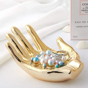 

Gold Ceramic Storage Plate Luxurious Lady Hand Jewelry Ring Desktop Storage Tray Home Decor Unique Organizer