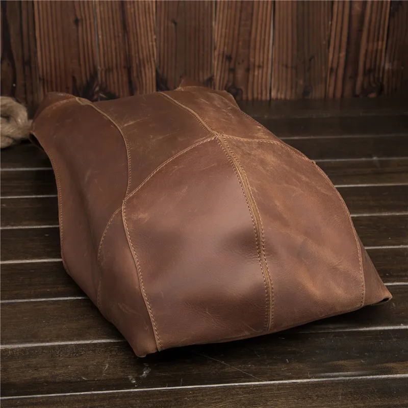 Elegante mochila Vintage para hombre y mujer, bolso de negocios de cuero, bolso de viaje para niños, bolso de mano grande antirrobo de piel de vaca para hombre y mujer