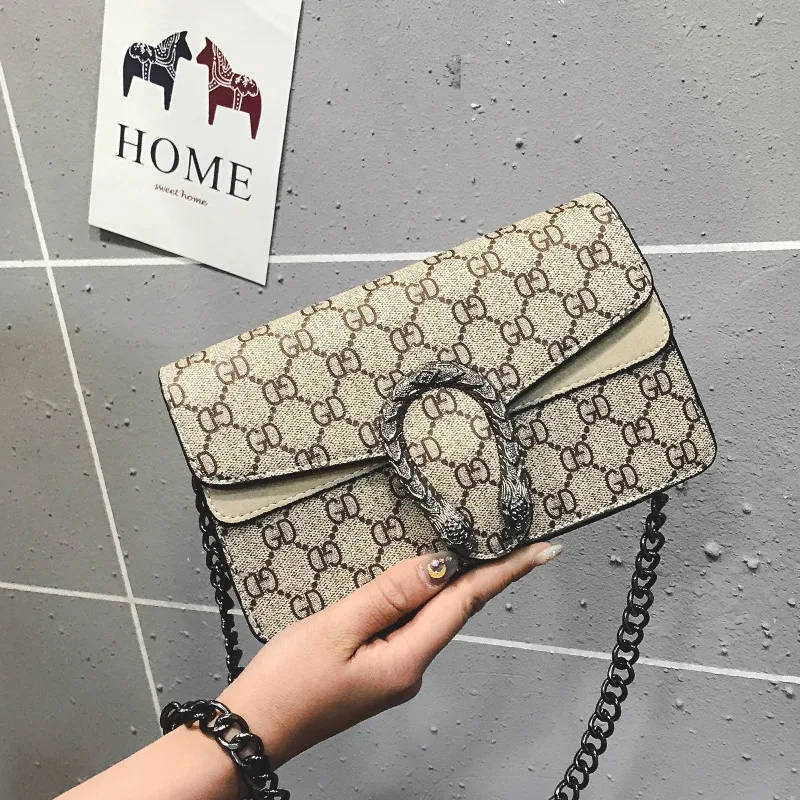 High quality luxury lady bag 2019 New Retro PU lock lady Single Shoulder Bag Fashion printing chain oblique Bag