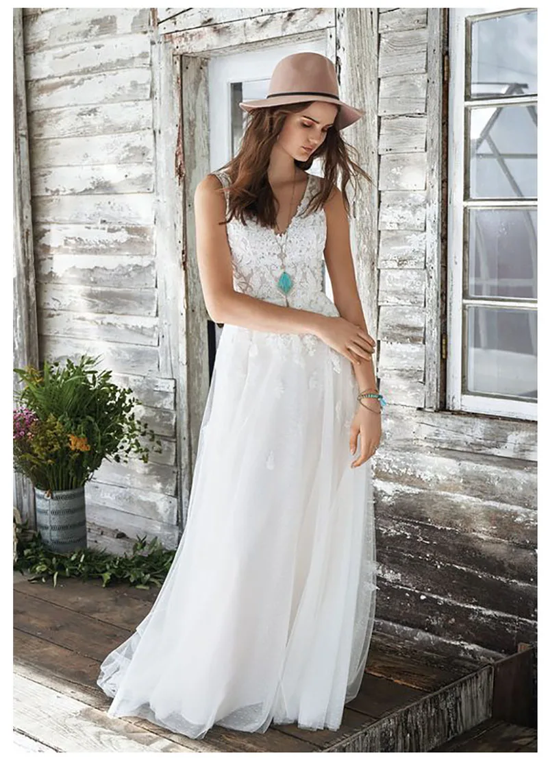 

LORIE Wedding Dress 2019 Lace Appliques V Neck Bride Dress Puff Tulle Backless Sexy Floor Length White Ivory Wedding Gown