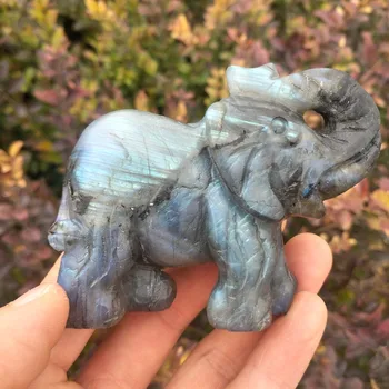 

Small elephants carved from natural labrador stone are used as home decoration