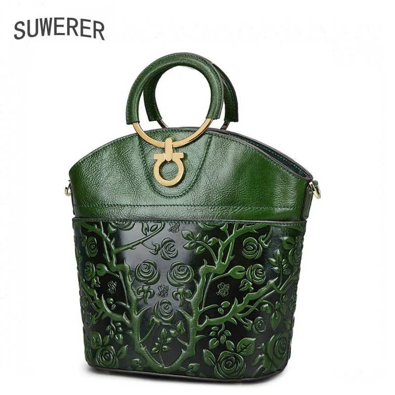 

Leather handbag 2017 new national wind pressure flower personality personalized shoulder Messenger bag Bucket bag