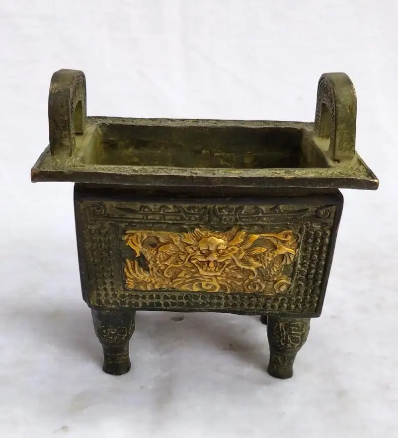 

Collection chinese old bronze gilt carved Dragon tripod Incense Burner Home art decoration Antique censer Height 12 CM /4.7 INCH