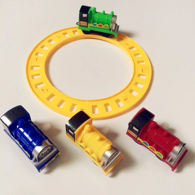 

On the chain mini rail car assembled track toy cake scene decoration